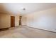 Open living room has neutral paint and plush carpet at 1654 E 2Nd St, Mesa, AZ 85203