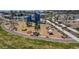 Community playground with modern play structures, swings, and climbing features for enjoyment at 17620 W Georgia Ave, Litchfield Park, AZ 85340