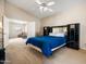 Spacious bedroom with high vaulted ceiling features comfortable carpet and modern decor at 20404 N 28Th Pl, Phoenix, AZ 85050