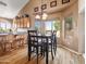 Charming dining area adjacent to the kitchen, featuring a table and scenic window views at 20404 N 28Th Pl, Phoenix, AZ 85050