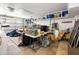 An organized garage with ample storage space, featuring a car, shelves, and overhead lighting at 20404 N 28Th Pl, Phoenix, AZ 85050