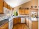 Kitchen features a range, ample counter space, and plenty of cabinet storage at 20404 N 28Th Pl, Phoenix, AZ 85050