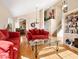 Open-concept living room with hardwood floors, bright lighting, and comfortable seating at 20404 N 28Th Pl, Phoenix, AZ 85050