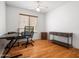 Minimalist office space features modern desk and ample natural light from the window at 20404 N 28Th Pl, Phoenix, AZ 85050