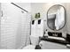 Stylish bathroom with subway tile shower and modern fixtures at 2044 W 1St St, Mesa, AZ 85201