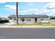 Charming single-story home features a well-maintained lawn and welcoming curb appeal at 2044 W 1St St, Mesa, AZ 85201