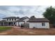 The backyard and exterior of the home shows off its gravel perimeter at 2060 E Quartz St, Mesa, AZ 85213