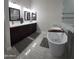 Modern bathroom featuring a soaking tub and a large vanity with double sinks at 2060 E Quartz St, Mesa, AZ 85213