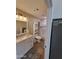 Bathroom featuring vanity, toilet and tiled shower/tub combination at 2060 E Quartz St, Mesa, AZ 85213