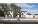 Elegant front facade of a two-story home with manicured landscaping, providing curb appeal at 2060 E Quartz St, Mesa, AZ 85213