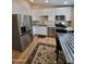 Modern kitchen with stainless steel appliances and white cabinets at 2060 E Quartz St, Mesa, AZ 85213