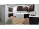 Convenient laundry area with modern appliances and ample counter space at 2060 E Quartz St, Mesa, AZ 85213