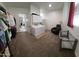 Large laundry room with washer, dryer, cabinets, and additional storage at 2060 E Quartz St, Mesa, AZ 85213