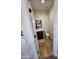 A well-lit powder room with a modern vanity, mirror, and fixtures at 2060 E Quartz St, Mesa, AZ 85213