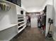 Organized walk-in closet with custom shelving and ample storage space at 2060 E Quartz St, Mesa, AZ 85213