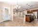 Open-concept living space with tiled floors, seamlessly connecting the kitchen at 21401 E Russet Rd, Queen Creek, AZ 85142