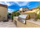 Outdoor kitchen featuring a built-in BBQ at 21401 E Russet Rd, Queen Creek, AZ 85142