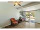 Bonus room featuring a sliding door, tile floor, and various types of furniture at 2201 W Wethersfield Rd, Phoenix, AZ 85029