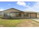 Charming single story home with low maintenance front yard, attached garage, and neutral color palette at 2201 W Wethersfield Rd, Phoenix, AZ 85029