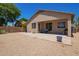 Backyard with a covered patio, gravel, and block wall landscaping at 2641 E Binner Dr, Chandler, AZ 85225