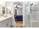 Bathroom view showcasing a shower and vanity leading into the bedroom at 2641 E Binner Dr, Chandler, AZ 85225