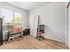 Versatile room with a bench, desk, and natural light from a large window at 2641 E Binner Dr, Chandler, AZ 85225