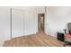 A tidy closet and a view into an ensuite bathroom in this bedroom at 2641 E Binner Dr, Chandler, AZ 85225