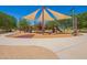 Shaded playground with jungle gym, slides, and a picnic area at 2641 E Binner Dr, Chandler, AZ 85225