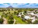 Aerial view of community, golf course, and surrounding mountains at 2737 E Arizona Biltmore Cir # 8, Phoenix, AZ 85016
