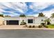 Stunning single-story home with a modern design and well-maintained landscaping at 2737 E Arizona Biltmore Cir # 8, Phoenix, AZ 85016