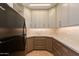 Kitchen features under cabinet lighting and modern appliances at 2737 E Arizona Biltmore Cir # 8, Phoenix, AZ 85016