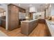 Gourmet kitchen features high-end stainless steel appliances, custom cabinetry, and a large center island at 2737 E Arizona Biltmore Cir # 8, Phoenix, AZ 85016