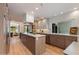 Contemporary kitchen features a center island, stainless steel appliances, and hardwood flooring at 2737 E Arizona Biltmore Cir # 8, Phoenix, AZ 85016