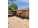 Home's exterior featuring covered patio with old swamp coolers, and a back entrance at 2825 E Adams St, Phoenix, AZ 85034