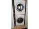Efficient stacked washer and dryer unit in a compact laundry space at 29606 N Tatum Blvd # 204, Cave Creek, AZ 85331