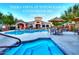 Community pool and spa for Terra Vista at Tatum Ranch Condominiums offers shaded tables and lounge chairs at 29606 N Tatum Blvd # 204, Cave Creek, AZ 85331