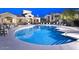 Terra Vista at Tatum Ranch Condominiums features a large, sparkling pool, shaded seating and lounge chairs at 29606 N Tatum Blvd # 204, Cave Creek, AZ 85331