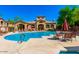 Sparkling blue community pool at Terra Vista at Tatum Ranch has a hot tub, shaded seating and lounge chairs at 29606 N Tatum Blvd # 204, Cave Creek, AZ 85331