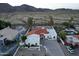 Luxury home with red tile roof, desert landscaping, and mountain views at 3738 E Kachina Dr, Phoenix, AZ 85044