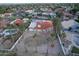 Expansive property with red-tiled roof, desert landscape, and potential for outdoor activities at 3738 E Kachina Dr, Phoenix, AZ 85044