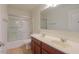 Bathroom featuring double sinks and a shower-tub combination at 42468 W Palmyra Ct, Maricopa, AZ 85138
