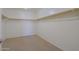 Walk-in closet with shelving, rod storage, and carpet flooring at 42468 W Palmyra Ct, Maricopa, AZ 85138