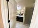 Bathroom with walk-in shower and a dark vanity with a mirror at 4805 E Kachina Trl # 25, Phoenix, AZ 85044