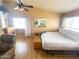 Comfortable primary bedroom boasts vaulted ceilings, two windows, and neutral paint tones at 4805 E Kachina Trl # 25, Phoenix, AZ 85044