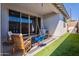 Backyard featuring artificial grass, a covered patio, and a swing at 4925 S Turbine --, Mesa, AZ 85212