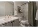 Bathroom featuring a vanity with sink, toilet, shower and tub combo, decorated with a picture at 4925 S Turbine --, Mesa, AZ 85212