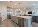 An open-concept kitchen seamlessly flows into the living area, creating a spacious and inviting atmosphere at 4925 S Turbine --, Mesa, AZ 85212