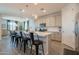 Stylish kitchen with white cabinets, a large center island, and stainless steel appliances at 4925 S Turbine --, Mesa, AZ 85212
