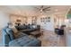 Open concept living space featuring a comfortable seating area and a view of the modern kitchen at 4925 S Turbine --, Mesa, AZ 85212