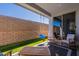 Patio featuring outdoor seating, artificial turf and a swing at 4925 S Turbine --, Mesa, AZ 85212